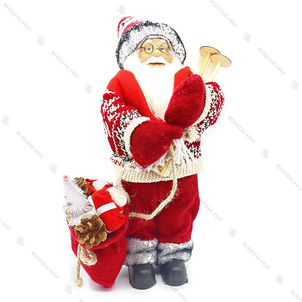 عروسک بابانوئل و چوب اسکی